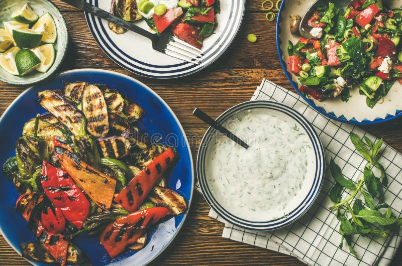 Flat-lay of vegan dinner table setting with healthy appetizers stock photos Flat-lay of vegan dinner table setting with healthy appetizers stock photos