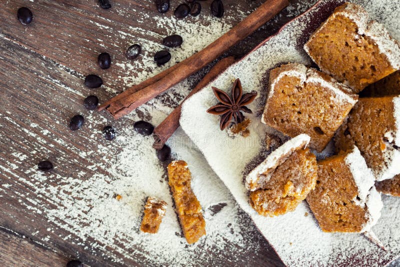 Flat lay homemade pumpkin - cinnamon bread with coffee beans on