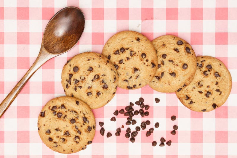 Flat Lay of Homemade Sweets, Chocolate Chip Cookie and Spoon on Red