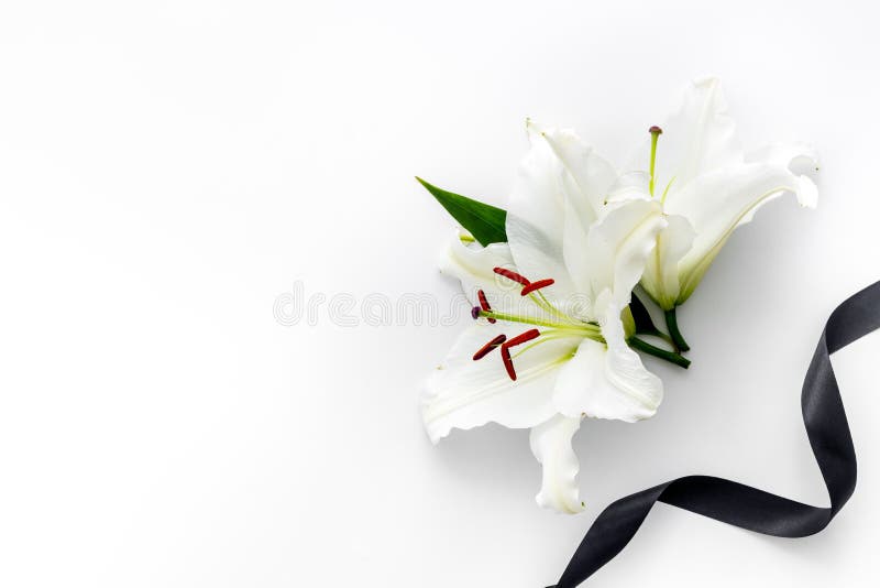 Flat Lay of Lily Flowers and Black Ribbon. Funeral Symbol Stock Photo ...