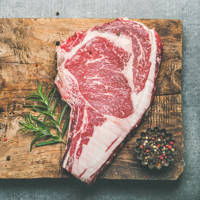 Raw Uncooked Beef Steak Rib-eye on Board, Square Crop Stock Photo ...