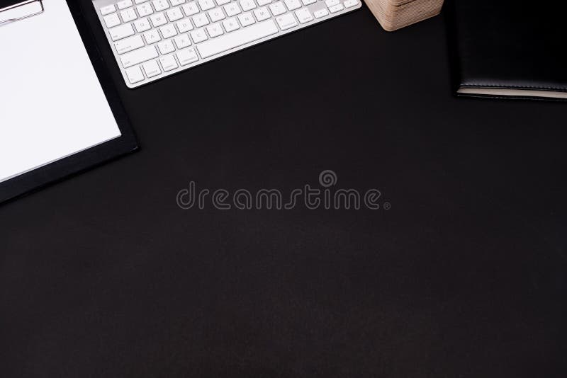 Flat Lay of Top View Black Work Table with Keyboard and Office Objects