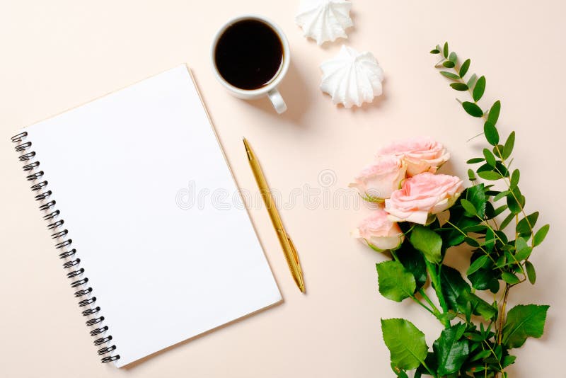 Flat lay, top view girls diary, coffee cup and flowers on pink background. Feminine desk workspace, home office table desk royalty free stock photos Flat lay, top view girls diary, coffee cup and flowers on pink background. Feminine desk workspace, home office table desk royalty free stock photos