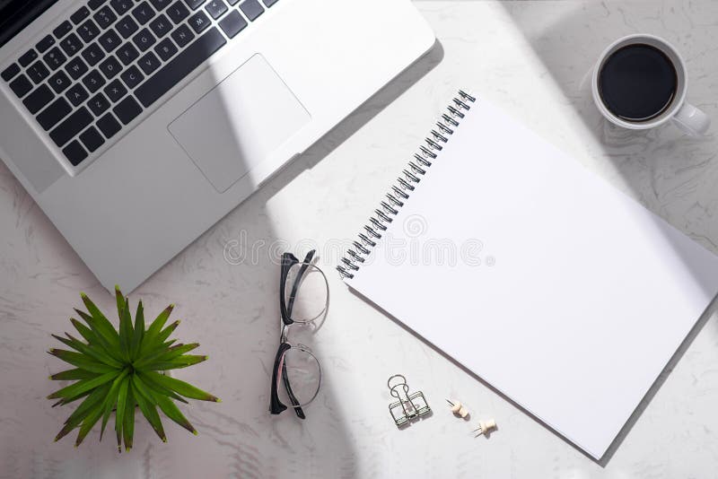 Flat lay, top view of open notebook and other supplies. stock images