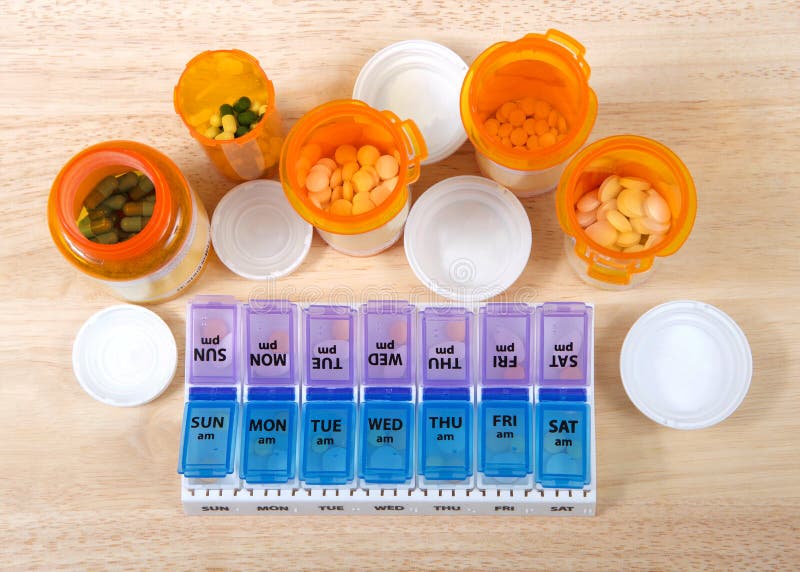 Pill Holder And Prescription Bottles Medication Management Stock