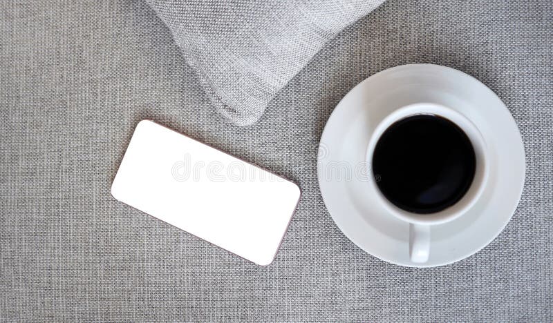 Flat Lay, Top view smartphone mockup with clipping path, with a cup of coffee with copy space, freelancer workplace or online royalty free stock images