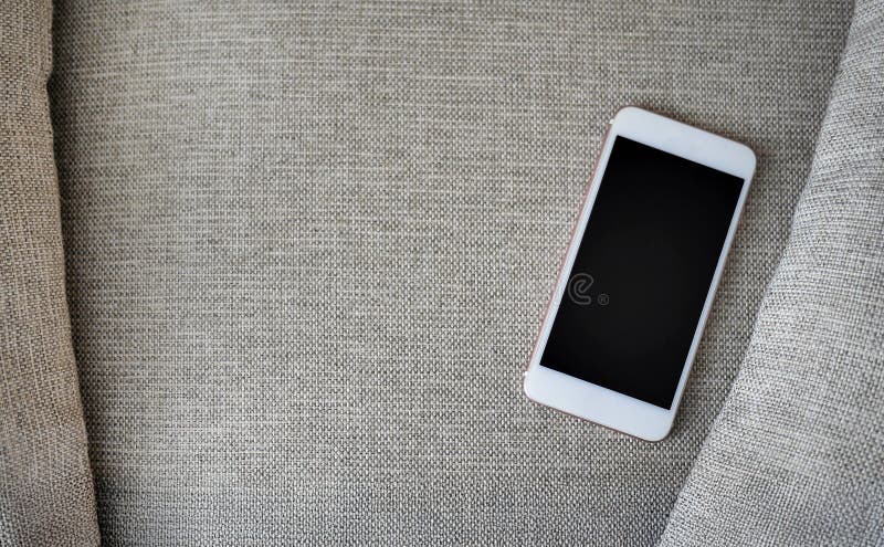 Flat Lay, Top view smartphone mockup and a cup of black coffee on fabric textile with copy space, digital NOMAD, freelancer stock photography