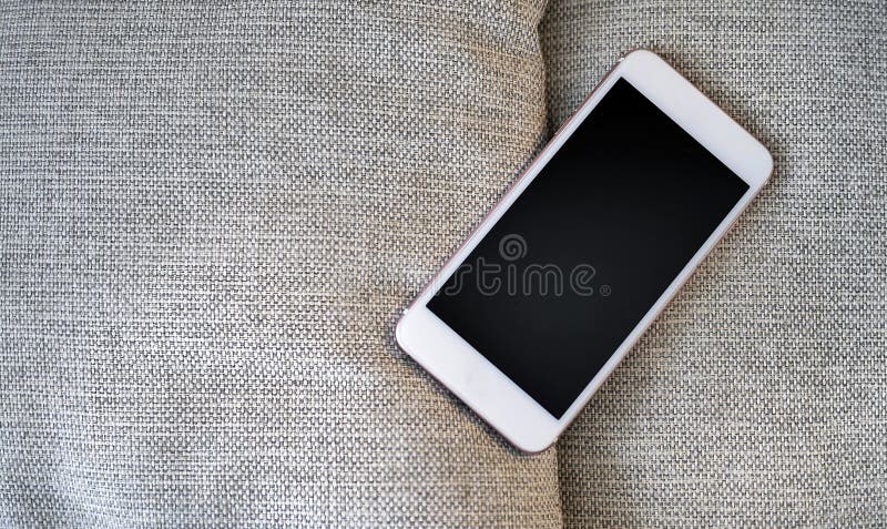 Flat Lay, Top view smartphone mockup and a cup of black coffee on fabric textile with copy space, digital NOMAD, freelancer stock image