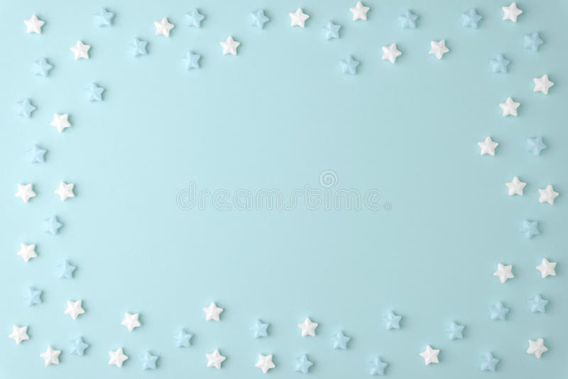 Flat lay top view tasty appetizing concept, minimal Sweet star Candy marshmallow Colorful pattern on blue pastel background stock photos