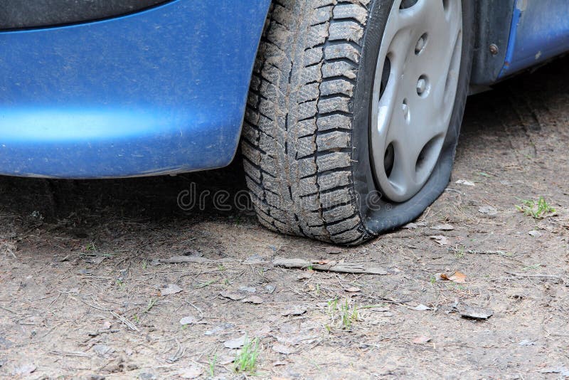 Flat tire car stock image. Image of burst, danger, hole 118586725