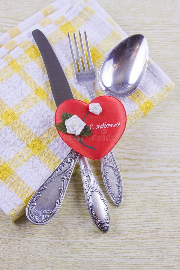 Flatwares Spoon, Fork and Knife with a Red Heart Stock Image Image of
