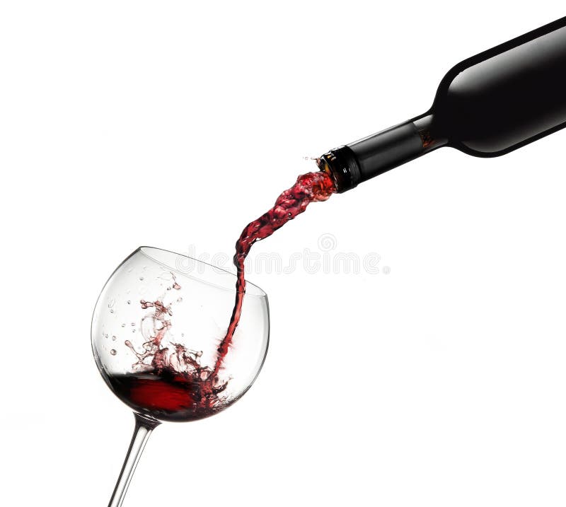 A bottle pouring red wine in glass with splashes, isolated on white background. A bottle pouring red wine in glass with splashes, isolated on white background