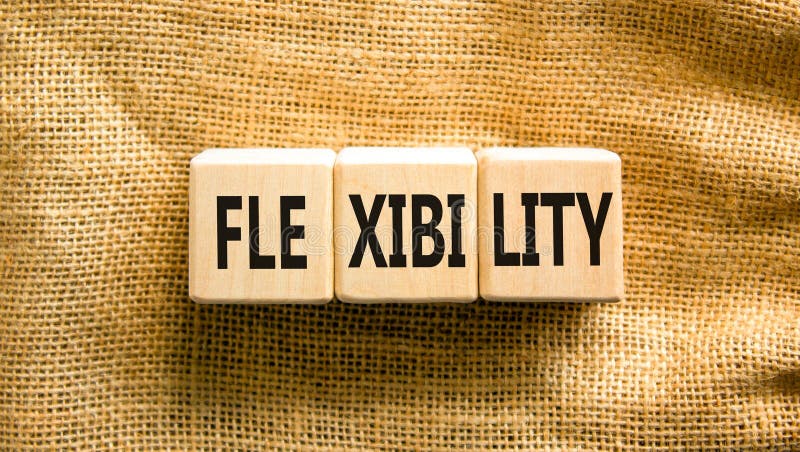 Flexibilitetssymbol. Begreppsflexibilitet för vackra träblock. vacker bakgrund till arbetsyta. flexibilitetsbegrepp för företag royaltyfri bild