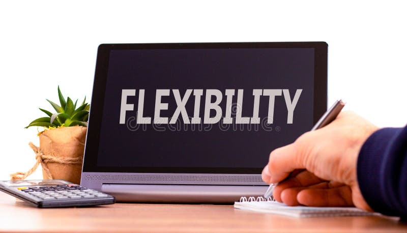 Flexibilitetssymbol. konceptordflexibilitet för vackra svarta tabletter. Vit bakgrund för vackert träbord. affärsman arkivfoton