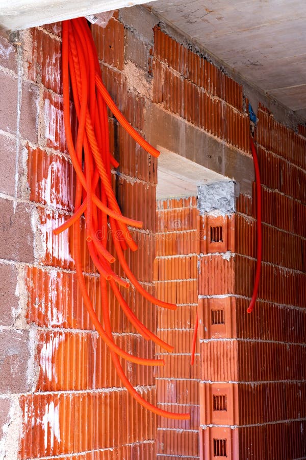 Flexible Electrical Conduit Corrugated Plastic Tubes Hanging from the Wall  Stock Image - Image of energy, conduit: 178560745