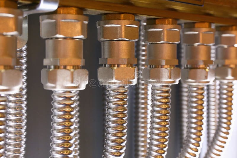 Flexible plumbing hoses stock photo. Image of background 70298060