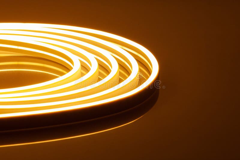 Flexible Warm White LED Neon Strip On Black Background Stock Photo