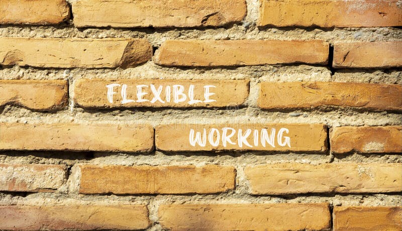 Flexible working symbol. Concept words Flexible working on beautiful brick wall. Beautiful red brown brick wall background. royalty free stock photo