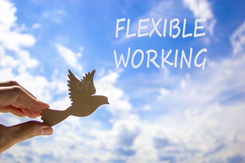 Flexible working symbol. Concept words Flexible working on beautiful sky. Beautiful blue sky cloud background. Businessman hand stock photos