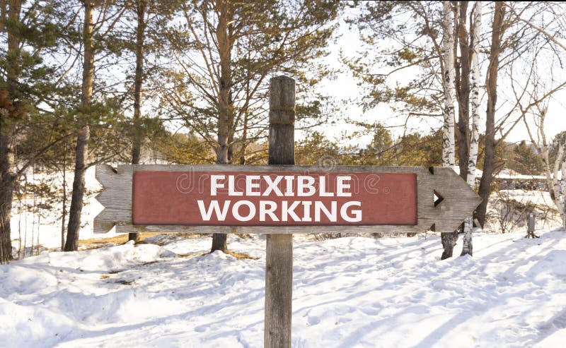Flexible working symbol. Concept words Flexible working on beautiful wooden road sign. Beautiful winter forest snow tree royalty free stock photos