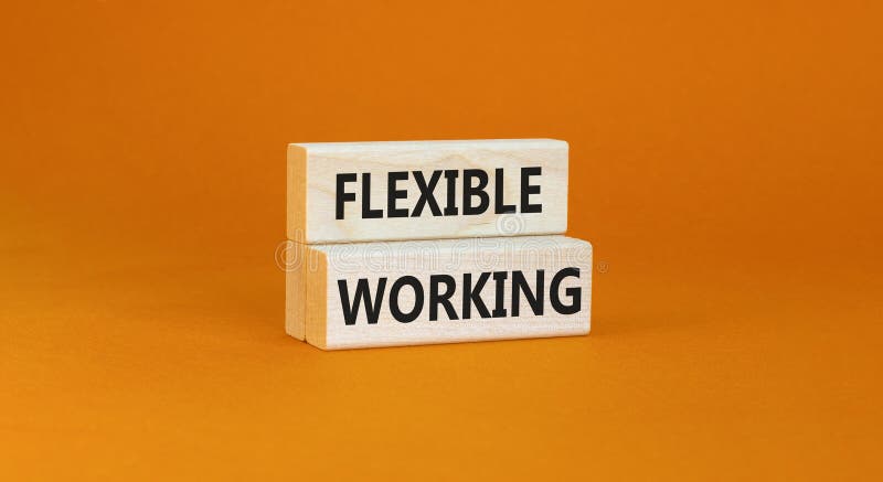 Flexible working symbol. Concept words Flexible working on beautiful wooden block. Beautiful orange paper background. Business stock image