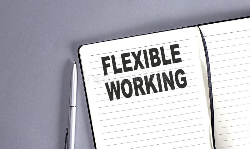 FLEXIBLE WORKING word on the notebook with pen stock images