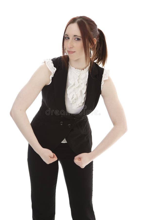 Young woman in business suit flexing her arm muscle against a white background. Young woman in business suit flexing her arm muscle against a white background