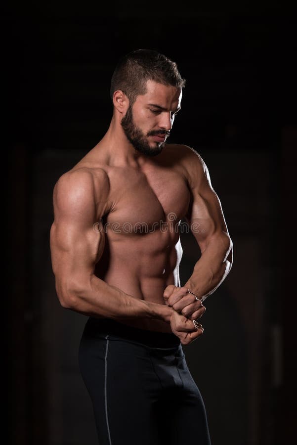 Flexing Muscles modelo fotos de stock
