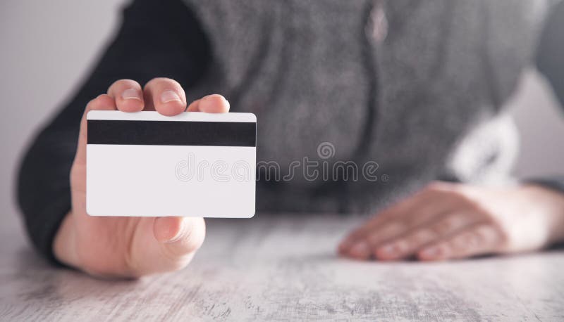 Flickavisningkreditkort i regeringsställning Aff?r royaltyfria bilder Flickavisningkreditkort i regeringsställning Aff?r royaltyfria bilder