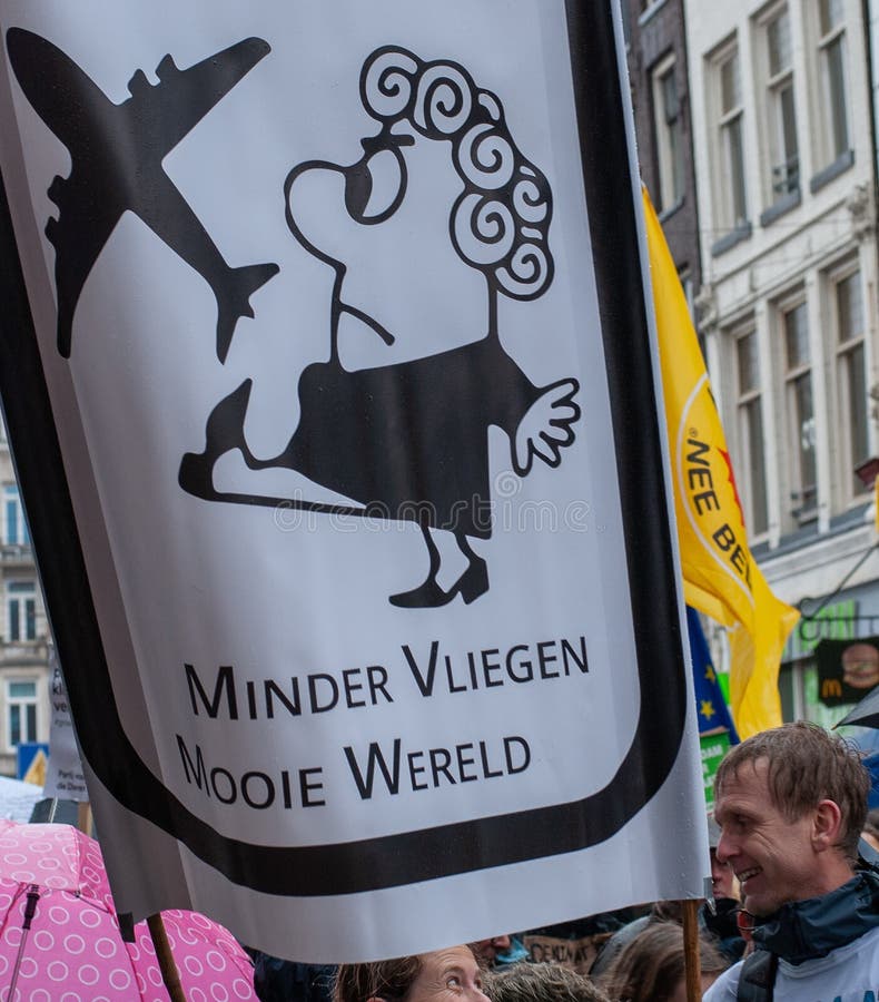 Less Flights Better World. Sign at People`s Climate March 10 March 2019 in Amsterdam with text: less flights, better world royalty free stock photo Less Flights Better World. Sign at People`s Climate March 10 March 2019 in Amsterdam with text: less flights, better world royalty free stock photo