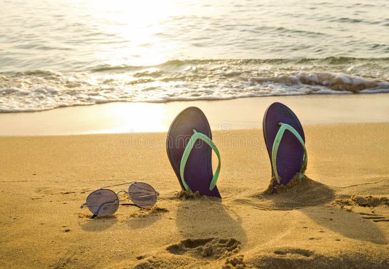 Flip-flop and Sunglasses on the Beach at the Sunset Stock Image - Image ...