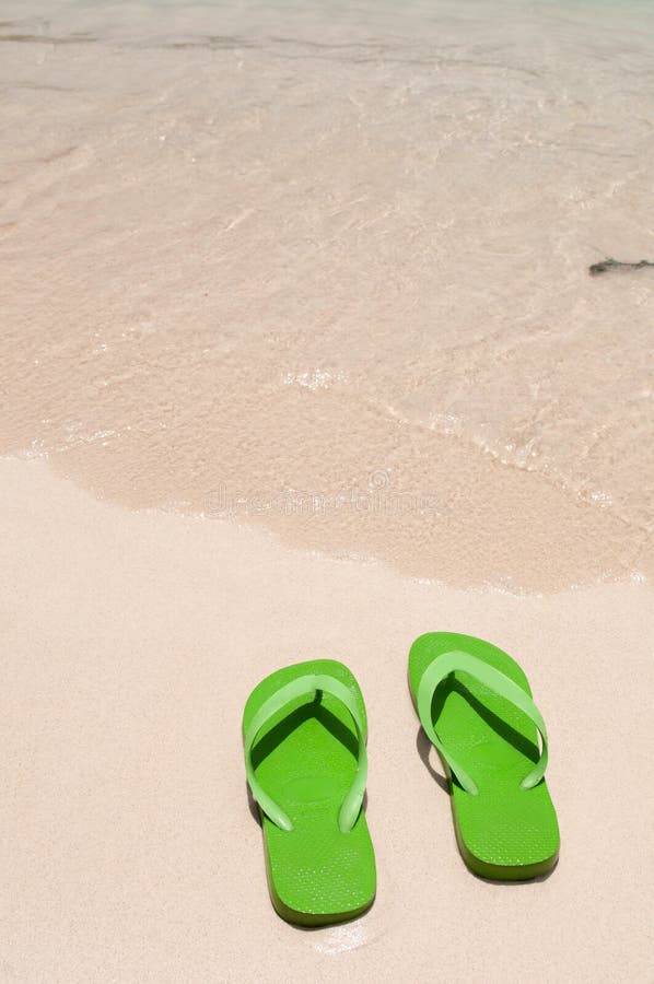 Green Flip Flops on Beach stock image. Image of space - 23388485