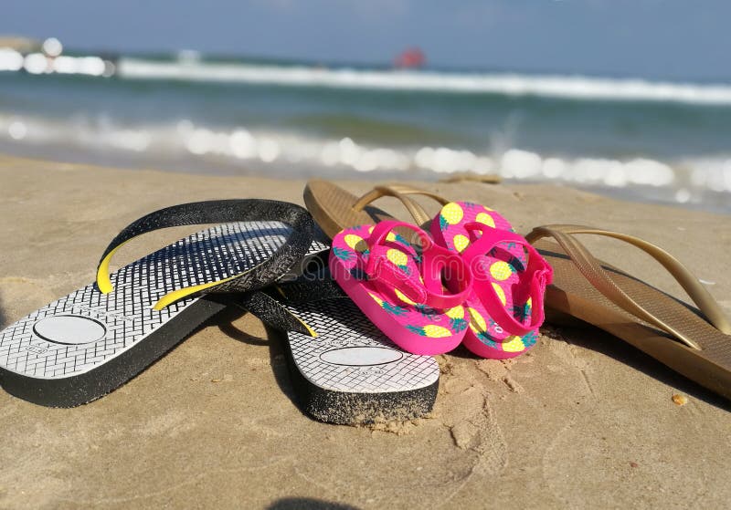 Flip flops on the beach stock image. Image of close, sand - 98279455