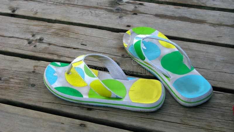 Flip flops on the boardwalk royalty free stock images Flip flops on the boardwalk royalty free stock images