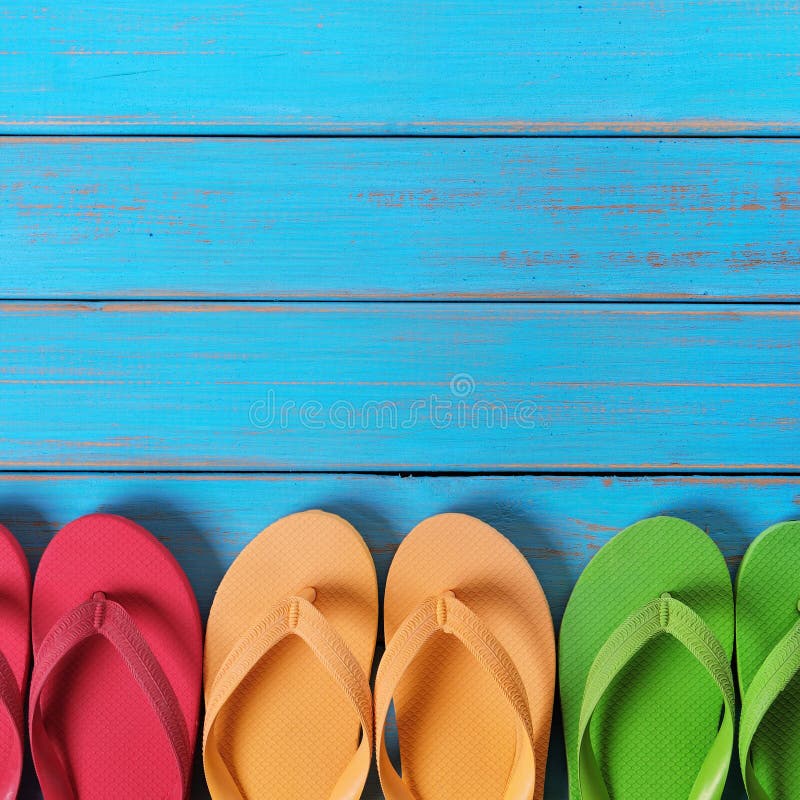 Flip Flops in a Row Blue Beach Wood Background Stock Photo - Image of ...