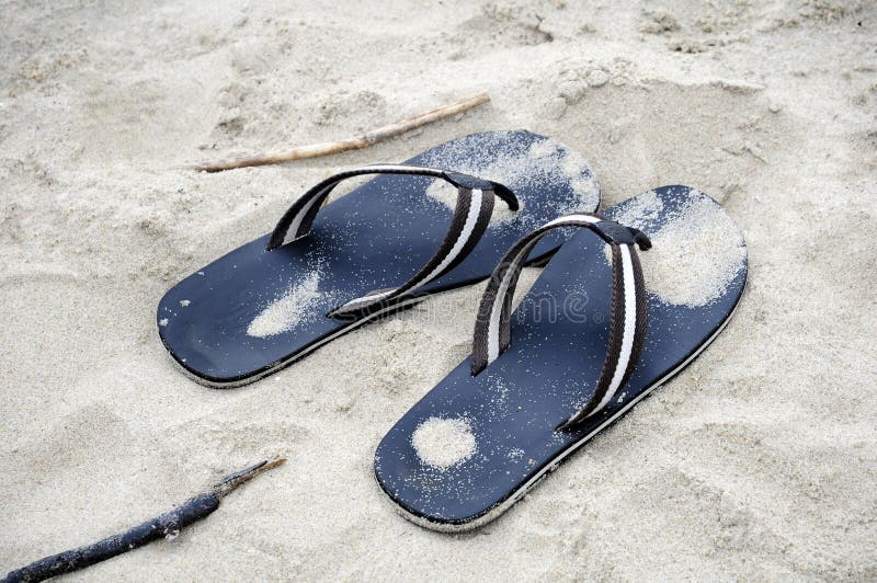 Flip flops in sand stock image. Image of summer, wear - 11899383