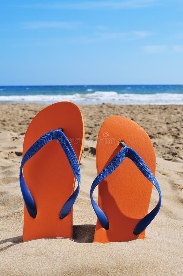 Flip-flops on the Sand of a Beach Stock Image - Image of outdoors, foot ...