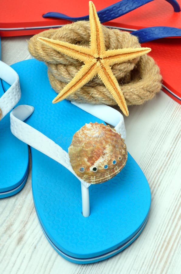 Flip-flops, starfish and seashells. stock images Flip-flops, starfish and seashells. stock images
