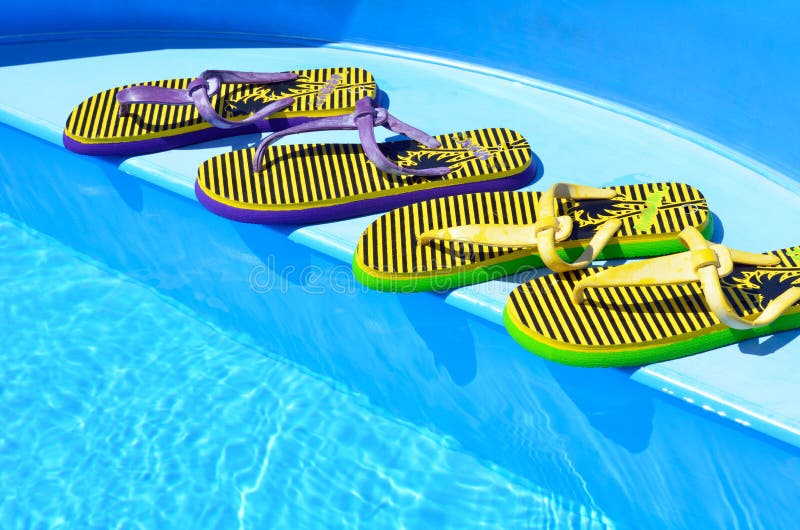 Flip flops on the Swimming Pool. Stock Photo Image of foot, pool