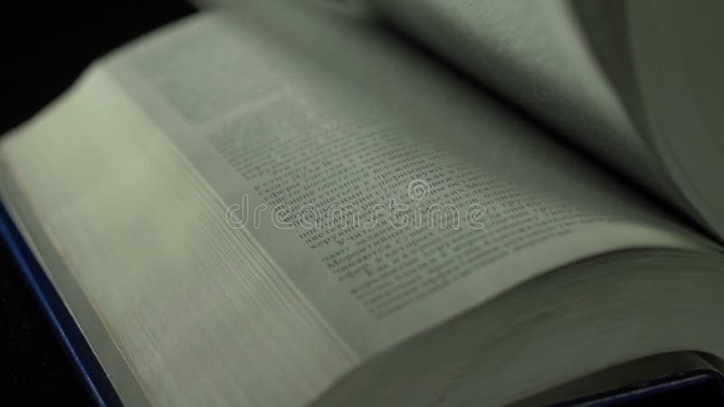 Flipping book pages close up, Slow motion