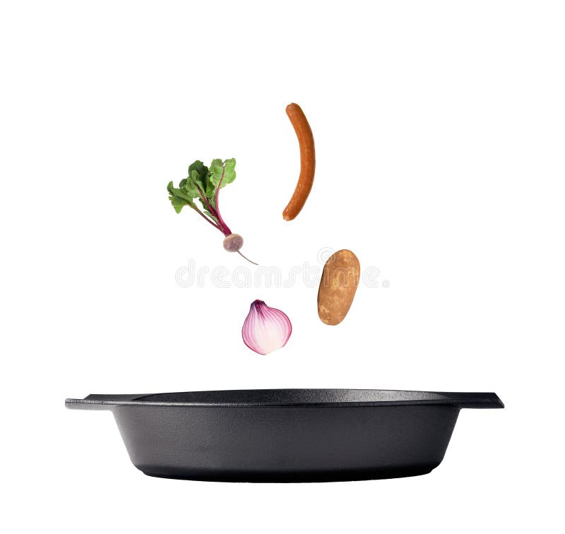 Flipping veggies with pan studio isolated stock photos