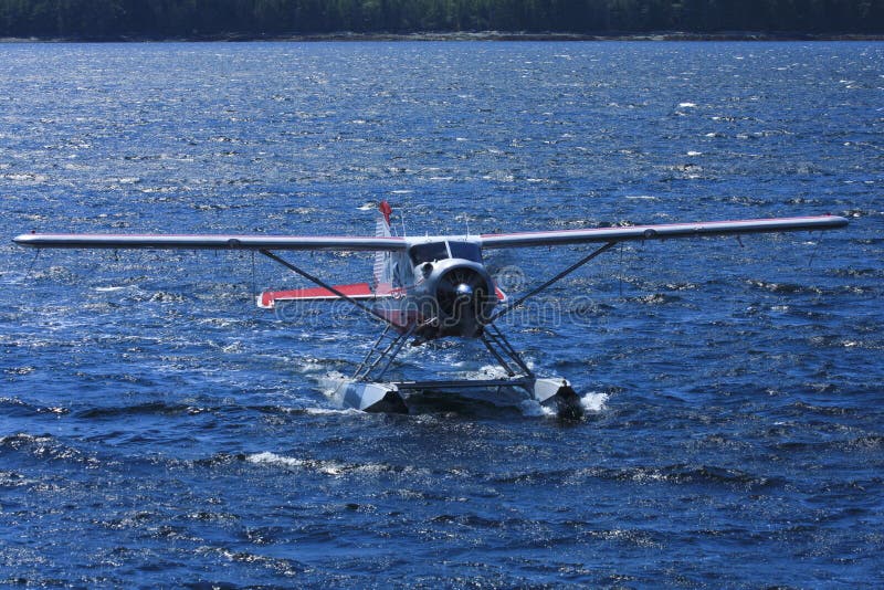 Float plane in blue ocean water