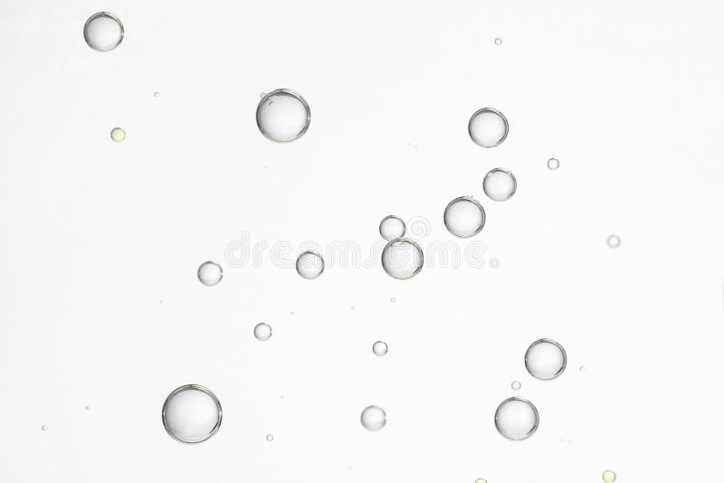 Floating fizz bubbles over gradient background stock photos Floating fizz bubbles over gradient background stock photos