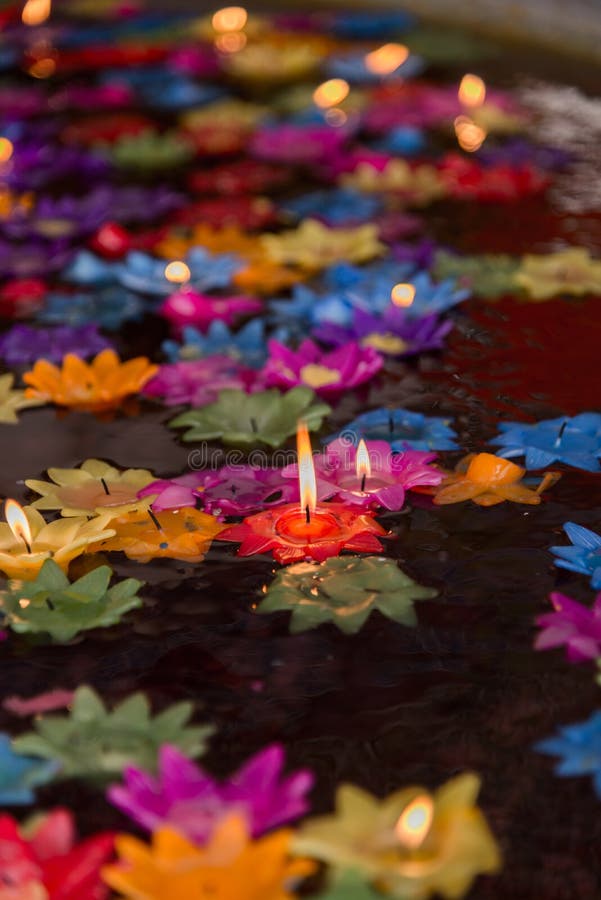 Floating Flower Candles In Water For Make Merit In The Buddhist Stock