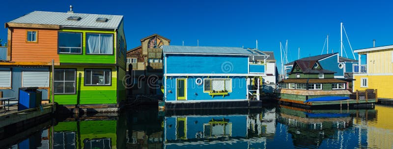 Floating Home Village Houseboats Fisherman`s Wharf Inner Harbor, Victoria British Columbia Canada.Area has floating homes, boats,. Piers, restaurants and stock images Floating Home Village Houseboats Fisherman`s Wharf Inner Harbor, Victoria British Columbia Canada.Area has floating homes, boats,. Piers, restaurants and stock images