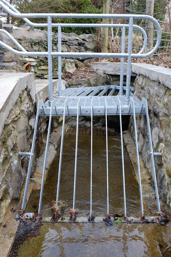Flood prevention grill. stock photo. Image of stream 38402018