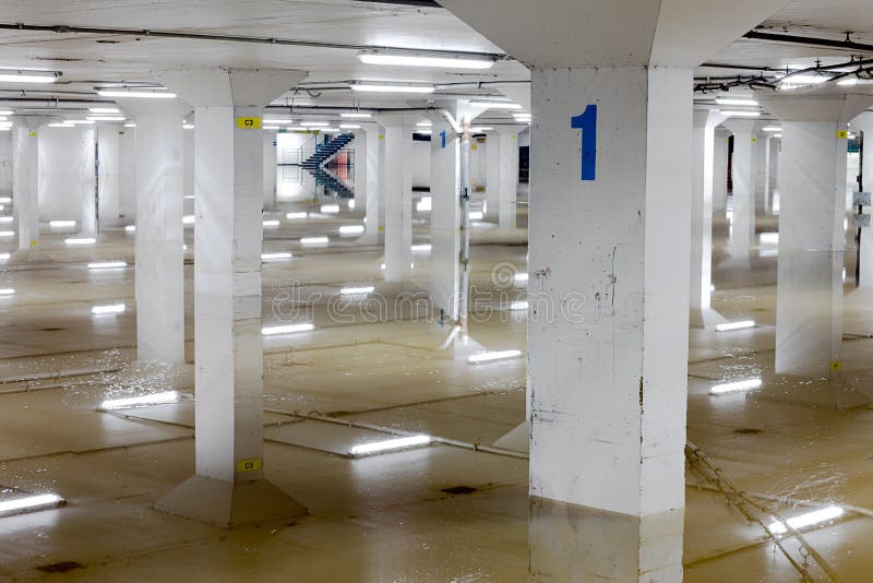 Flooded Car Garage Numbered Columns