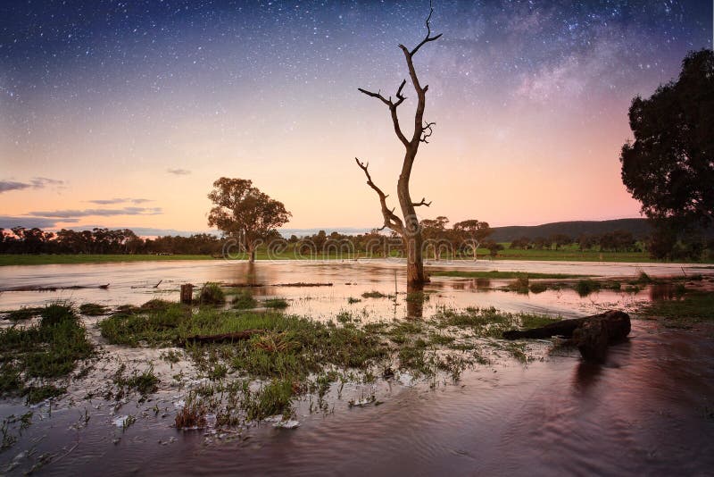 Floodwaters dusk to evening Outback Australia royalty free stock photo Floodwaters dusk to evening Outback Australia royalty free stock photo
