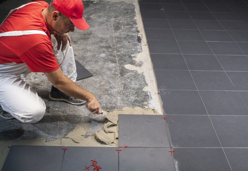 Floor Ceramic Tiles Installation. Create, Arranging Stock Photo Image