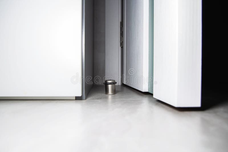 The Floor Door Stop Restricts the Movement of the Interior Door from